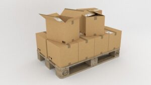 stacked moving boxes on a palette ready for renting storage in Jeddah
