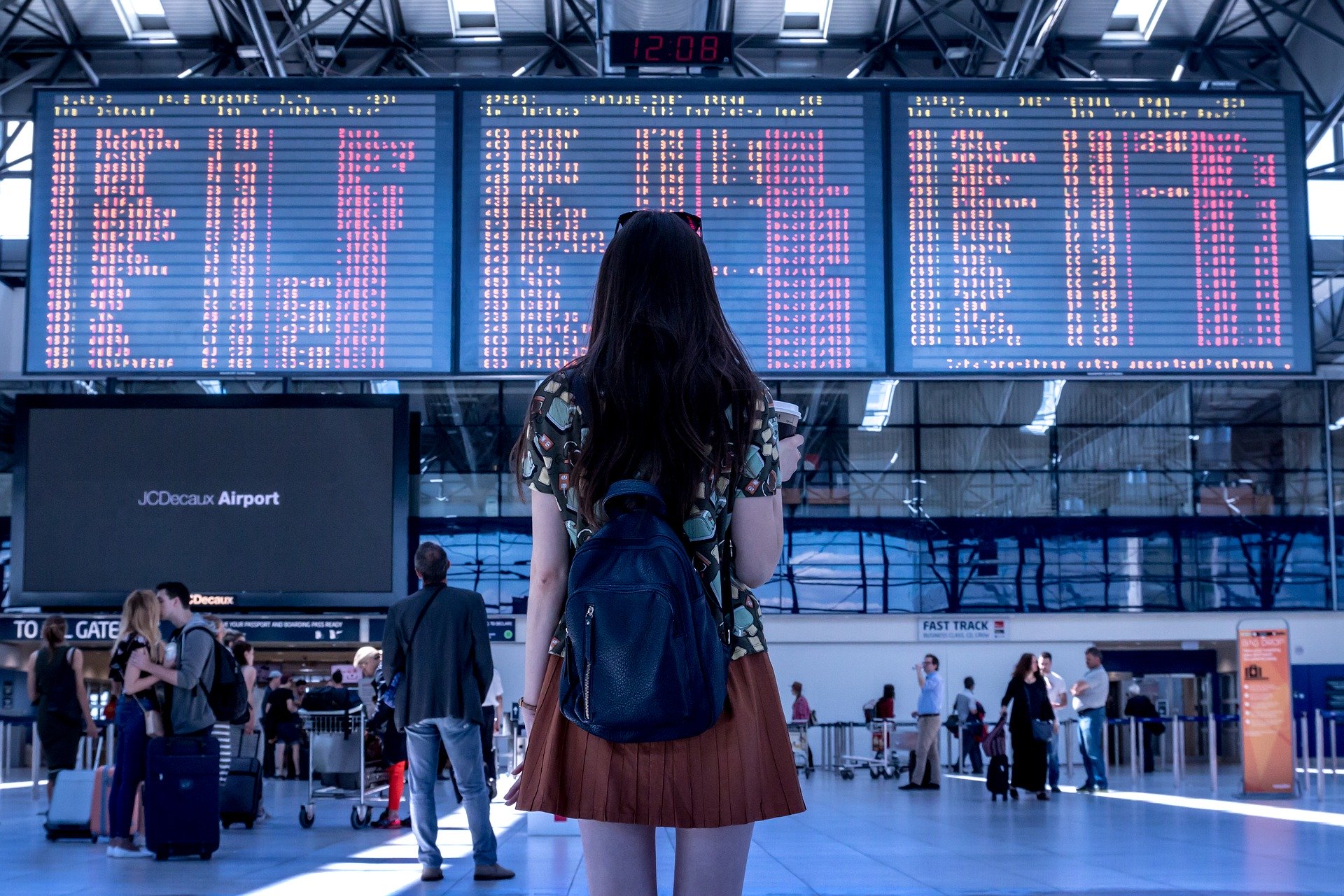 A girl at the airport after choosing one of the residential neighborhoods in Hong Kong to move to.