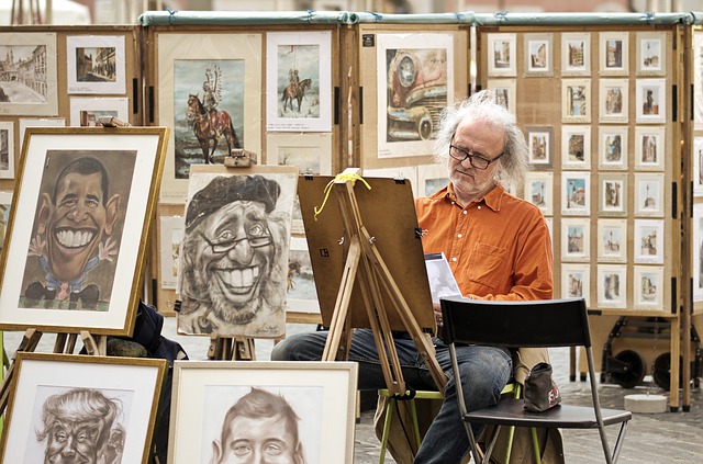 A man painting in his art studio.