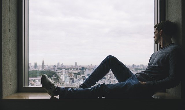 a man siting by the window