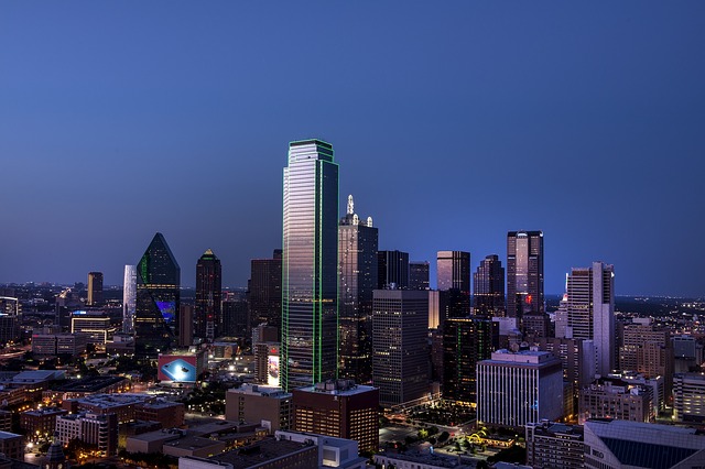 Dallas view at night with some of the most common architectural styles in Dallas.