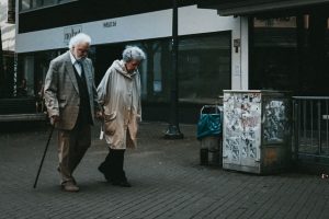 Two seniors walking and staying healthy while enjoying their life in a Longmont neighborhood for seniors.