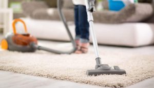 Vacuuming carpet