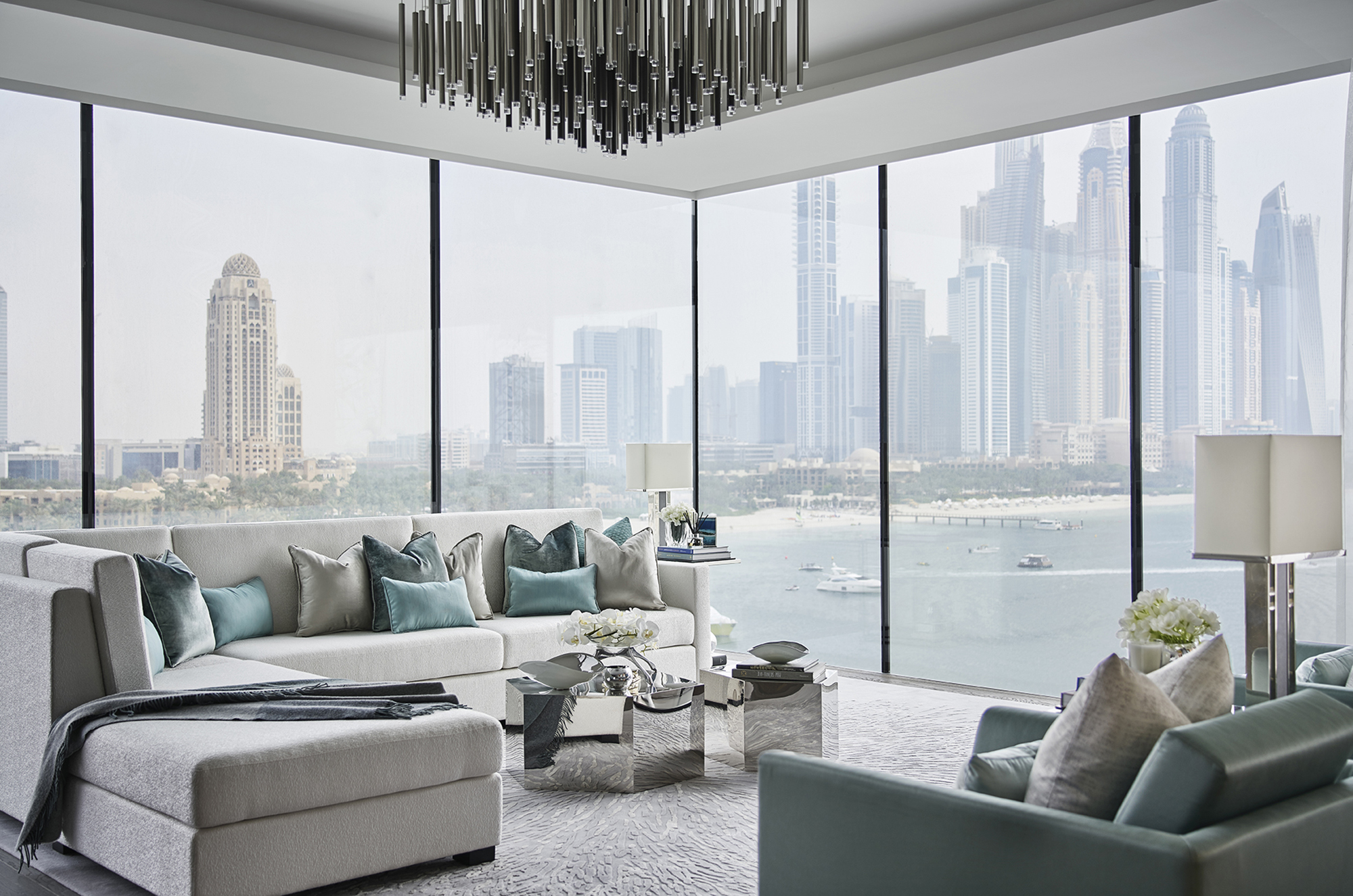 One-at-Palm-Jumeirah-Elicyon-Living-Room-Glass-Corner-Day by copperstones properties