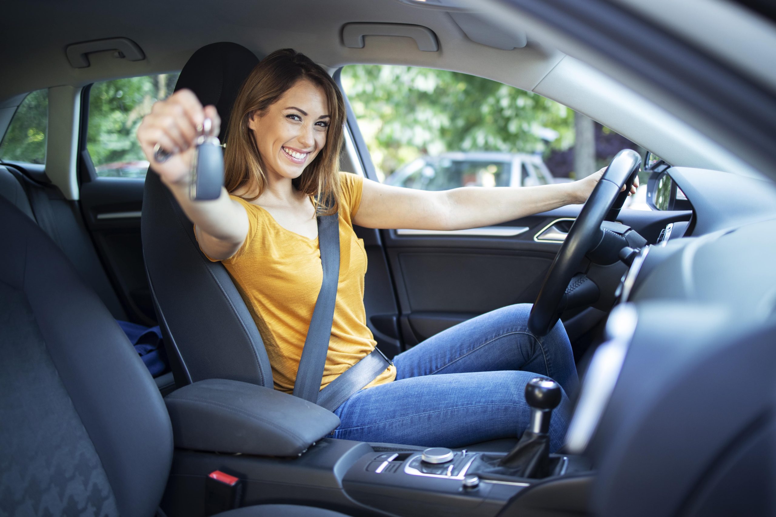 women driving car