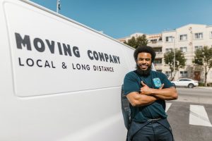 A pro mover in front of a van